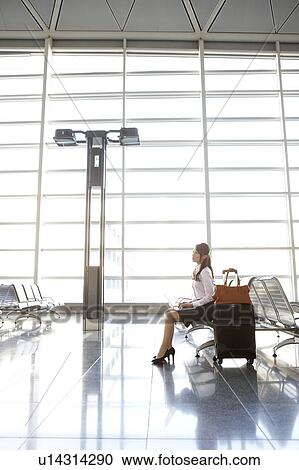 Stock Image - Businesswoman Traveling. Fotosearch