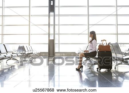 Stock Photo - Businesswoman Traveling. Fotosearch