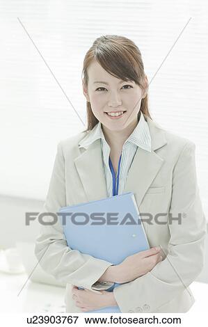 Businesswoman with File View Large Photo Image Stock Photo - Businesswoman with File. Fotosearch