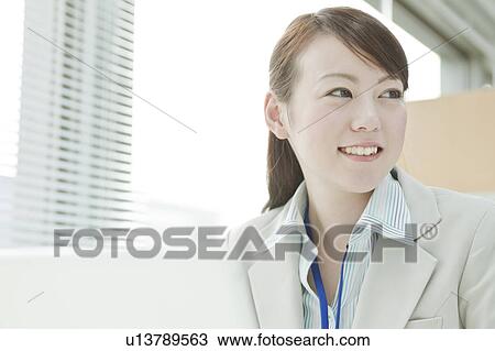 Businesswoman with Laptop View Large Photo Image Stock Image - Businesswoman with Laptop. Fotosearch