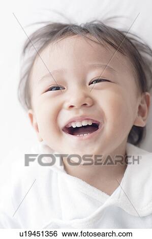 Stock Photograph - Cheerful Boy. Fotosearch