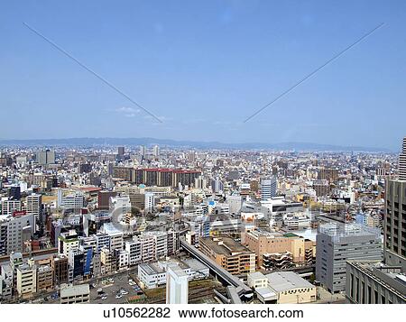 Stock Image - Cityscape of Osaka around Kyobashi station, Osaka Prefecture, Honshu, Japan. Fotosearch