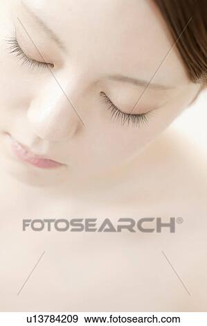 Stock Photo - Close Up of Young Woman. Fotosearch