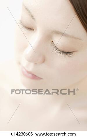 Stock Photograph - Close Up of Young Woman. Fotosearch
