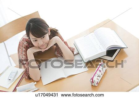 Collage Student at Desk View Large Photo Image Stock Image - Collage Student at Desk. Fotosearch