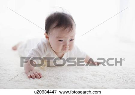 Stock Photo - Crying baby. Fotosearch