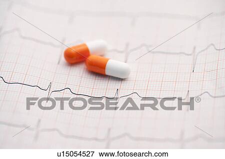 EKG and capsules View Large Photo Image Stock Photo - EKG and capsules. Fotosearch