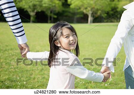 Family holding hands View Large Photo Image Stock Image - Family holding hands. Fotosearch