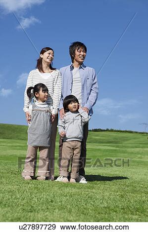 Family of Four in Field View Large Photo Image Stock Photo - Family of Four in Field. Fotosearch