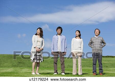 Picture - Family of Four with Adult Offspring. Fotosearch