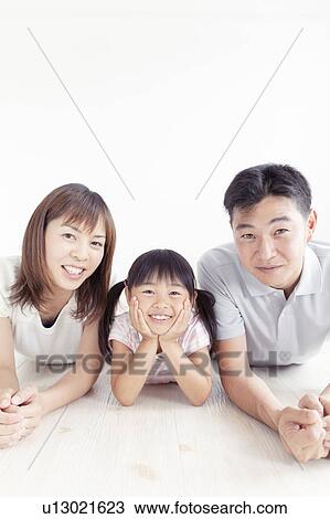 Family of Three Lying on Floor View Large Photo Image Stock Image - Family of Three Lying on Floor. Fotosearch
