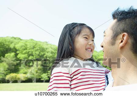 Father and daughter facing each other View Large Photo Image Stock Photography - Father and daughter facing each other. Fotosearch
