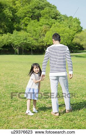 Father and daughter holding hands View Large Photo Image Stock Image - Father and daughter holding hands. Fotosearch