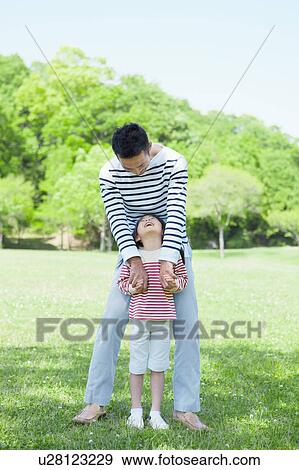 Father and daughter holding hands View Large Photo Image Stock Photo - Father and daughter holding hands. Fotosearch