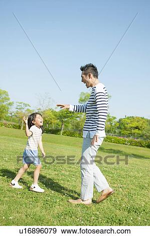 Father and daughter playing View Large Photo Image Stock Photo - Father and daughter playing. Fotosearch