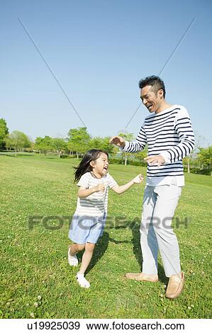 Father and daughter playing View Large Photo Image Stock Photo - Father and daughter playing. Fotosearch