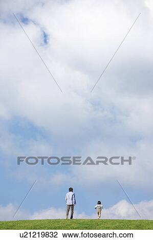 Father and Son in Field View Large Photo Image Stock Image - Father and Son in Field. Fotosearch