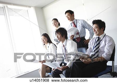 Stock Photo - Five Businesspeople Listening. Fotosearch