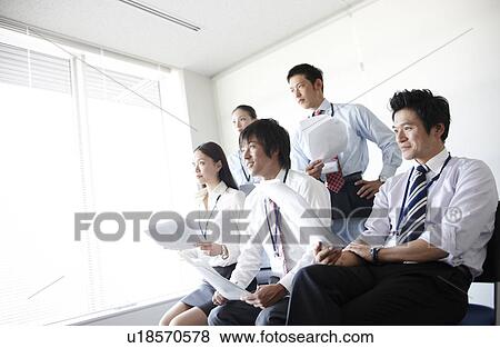 Stock Photo - Five Businesspeople Listening. Fotosearch