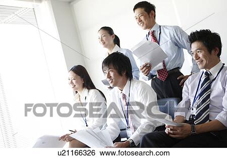 Stock Photograph - Five Businesspeople Listening. Fotosearch