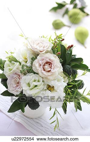 Picture - Flower Arrangement of Roses, Texas Bluebell, and Yuzu. Fotosearch