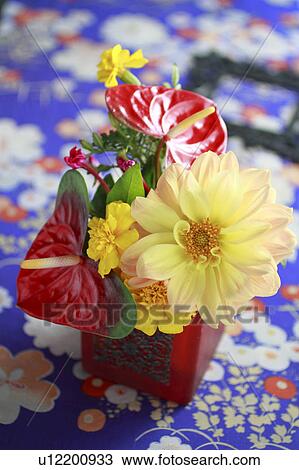 Stock Image - Flower Arrangement on Japanese Old Silk Cloth. Fotosearch