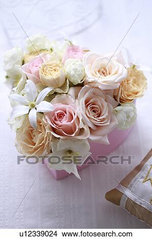 Flowers Put In Heart-shaped Box View Large Photo Image Picture - Flowers Put In Heart-shaped Box. Fotosearch