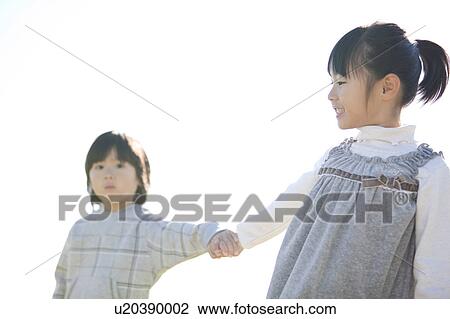Girl and Boy Holding Hands View Large Photo Image Stock Image - Girl and Boy Holding Hands. Fotosearch