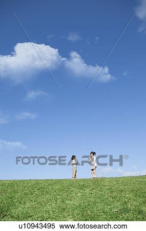 Girl and Boy with Tin Can Phone in Field View Large Photo Image Stock Photography - Girl and Boy with Tin Can Phone in Field. Fotosearch