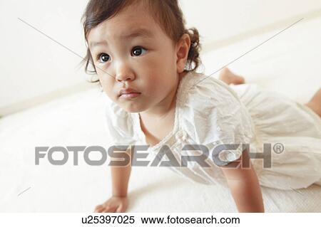 Stock Photography - Girl crawling. Fotosearch
