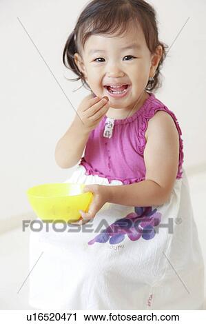 Girl eating grape View Large Photo Image Stock Image - Girl eating grape. Fotosearch