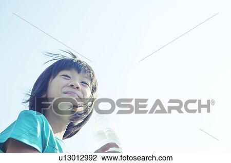 Stock Image - Girl Having Water. Fotosearch