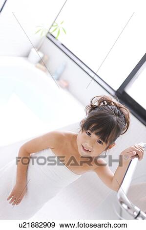 Stock Photo - Girl in Bathroom. Fotosearch
