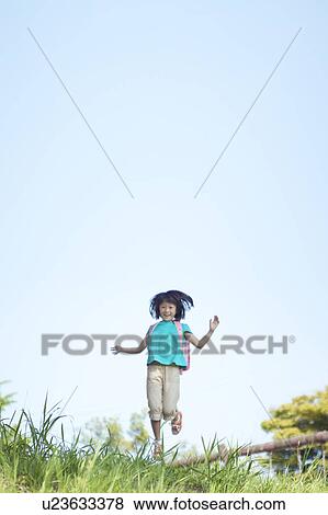 Girl Jumping in Field View Large Photo Image Stock Photo - Girl Jumping in Field. Fotosearch