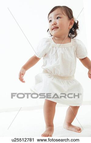 Stock Image - Girl looking away. Fotosearch