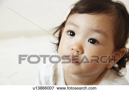 Girl looking away View Large Photo Image Stock Photo - Girl looking away. Fotosearch