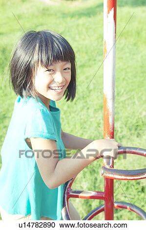 Girl Playing in Playground View Large Photo Image Stock Image - Girl Playing in Playground. Fotosearch