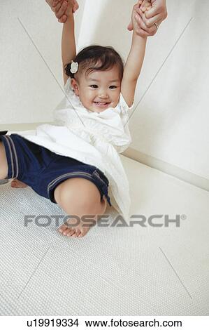 Girl playing with mom View Large Photo Image Picture - Girl playing with mom. Fotosearch