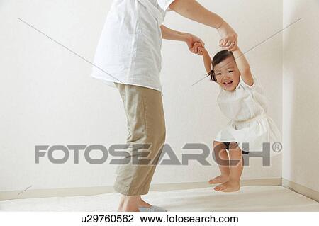 Girl playing with mom View Large Photo Image Stock Image - Girl playing with mom. Fotosearch