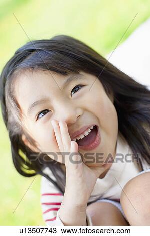 Stock Image - Girl shouting. Fotosearch