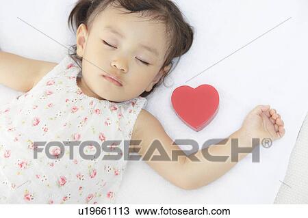 Stock Image - Girl sleeping. Fotosearch