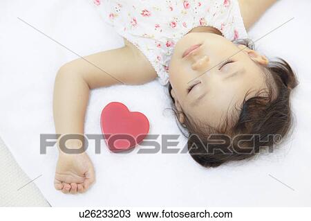 Stock Image - Girl sleeping. Fotosearch