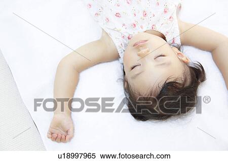 Stock Photography - Girl sleeping. Fotosearch