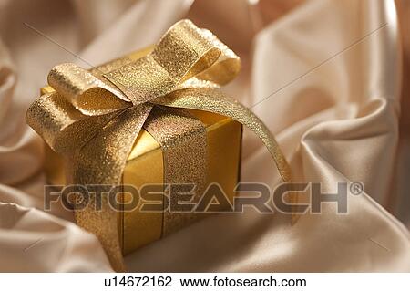 Stock Image - Golden Giftbox. Fotosearch