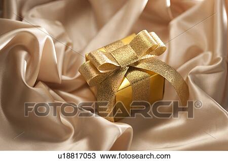 Stock Image - Golden Giftbox. Fotosearch