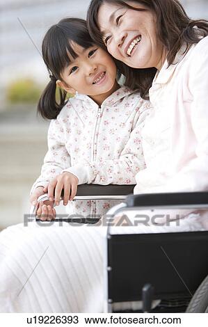 Stock Image - Granddaughter and Grandmother. Fotosearch