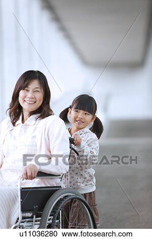 Granddaughter Pushing Grandmother on Wheelchair View Large Photo Image Stock Image - Granddaughter Pushing Grandmother on Wheelchair. Fotosearch