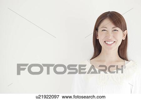 Stock Photo - Happy Mid Adult Woman. Fotosearch