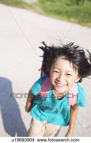Picture - Happy Schoolgirl. Fotosearch