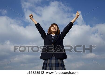 High School Student Holding Arms Up View Large Photo Image Stock Image - High School Student Holding Arms Up. Fotosearch